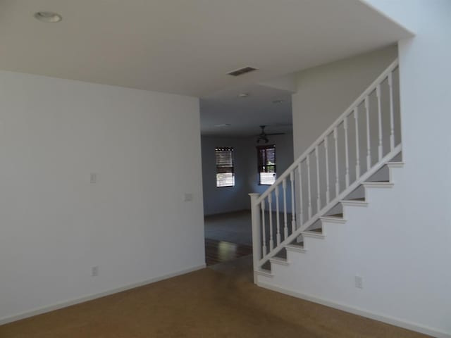 309 Pine Ct, Chowchilla, CA 93610 - stairway with carpet flooring, baseboards, and ceiling fan