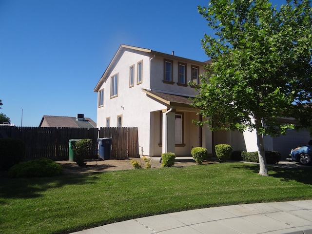 view of front of property featuring stucco siding