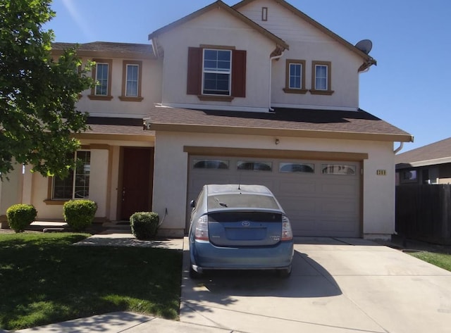 309 Pine Ct, Chowchilla, CA 93610 - view of front of house featuring driveway, an attached garage, stucco siding, and fence