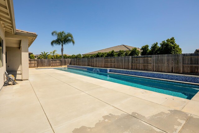 3636 Elberta Cir, Dinuba, CA 93618 - view of pool with a fenced backyard and a patio area