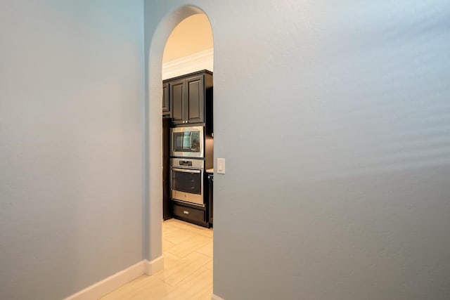 3636 Elberta Cir, Dinuba, CA 93618 - corridor with arched walkways and baseboards