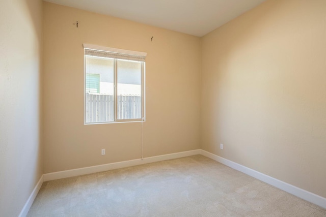 3636 Elberta Cir, Dinuba, CA 93618 - unfurnished room featuring light colored carpet and baseboards