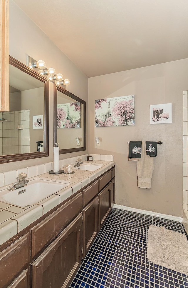 3732 W Garland Ave, Fresno, CA 93722 - bathroom with double vanity and tile patterned flooring