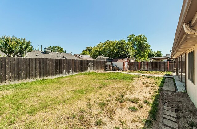 3732 W Garland Ave, Fresno, CA 93722 - view of yard featuring a shed and an outbuilding