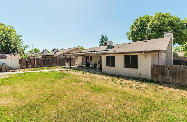 3732 W Garland Ave, Fresno, CA 93722 - back of house featuring a patio, a chimney, and central AC unit