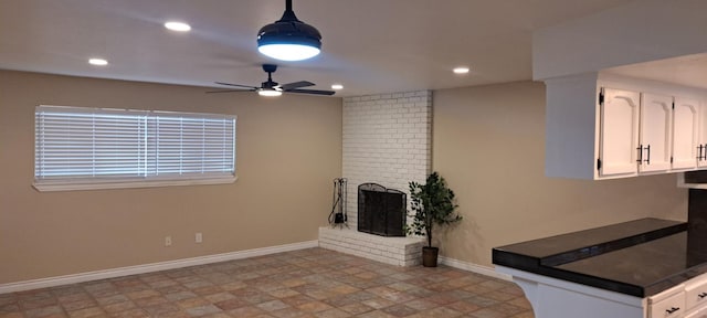 1690 W Wall Ln, Porterville, CA 93257 - unfurnished living room with baseboards, a fireplace, recessed lighting, and ceiling fan