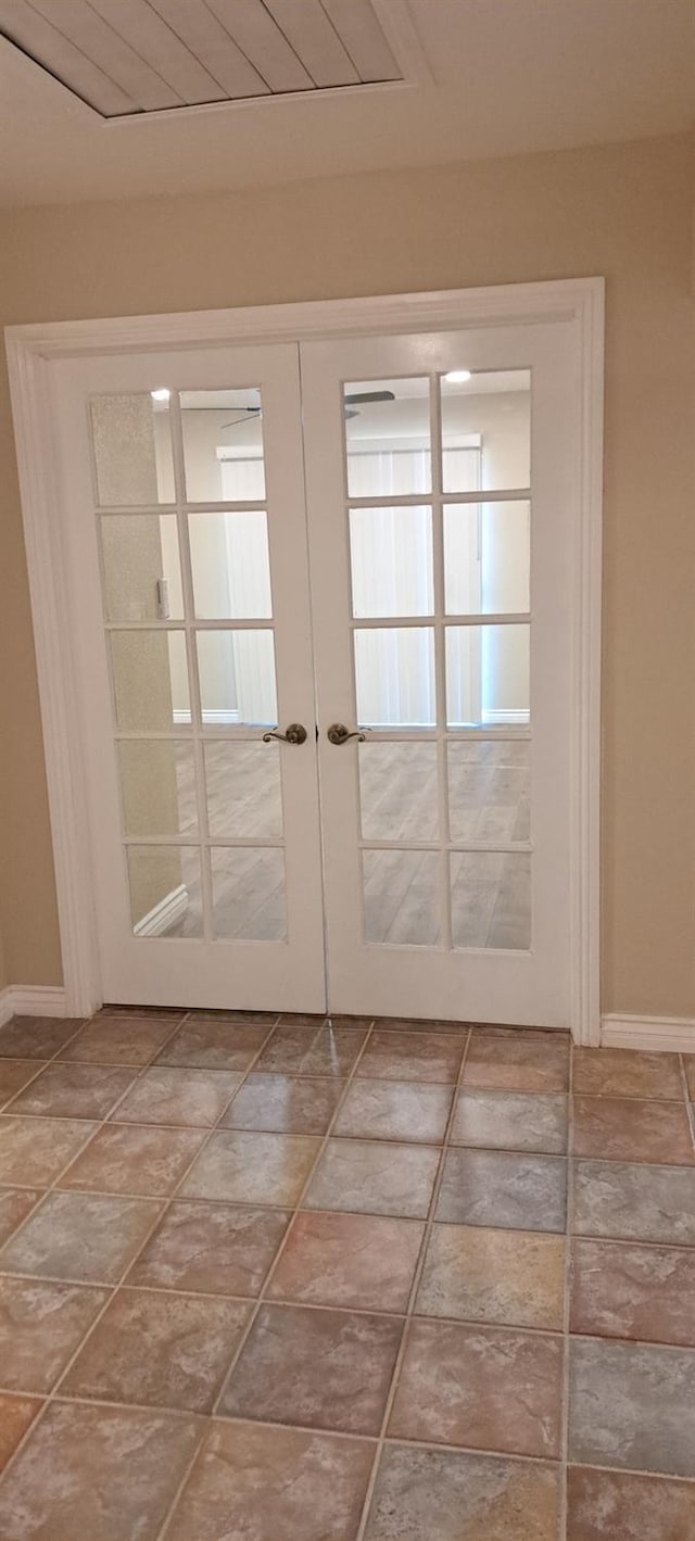 1690 W Wall Ln, Porterville, CA 93257 - entryway featuring french doors and baseboards