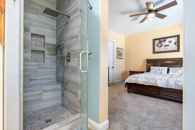 520 W Warwick, Clovis, CA 93619 - bathroom featuring tiled shower, ceiling fan, baseboards, and ensuite bathroom