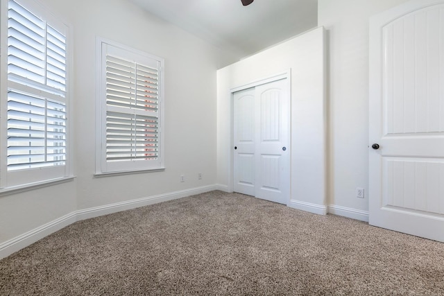 520 W Warwick, Clovis, CA 93619 - unfurnished bedroom featuring carpet flooring, multiple windows, and baseboards
