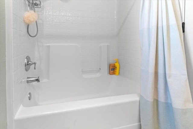 1117 E Royal Dornoch Ave, Fresno, CA 93730 - bathroom featuring shower / tub combo with curtain