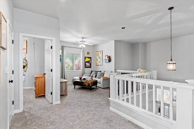 1117 E Royal Dornoch Ave, Fresno, CA 93730 - hall featuring carpet floors, baseboards, and an upstairs landing
