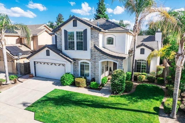 1117 E Royal Dornoch Ave, Fresno, CA 93730 - french country inspired facade featuring stone siding, stucco siding, and a tiled roof