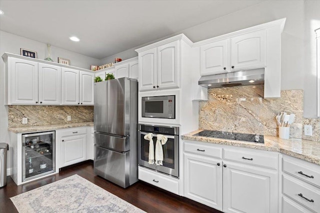 1117 E Royal Dornoch Ave, Fresno, CA 93730 - kitchen with stainless steel appliances, wine cooler, under cabinet range hood, decorative backsplash, and white cabinetry