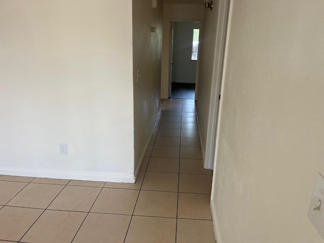 2645 W Robinson Ave, Fresno, CA 93705 - hall with light tile patterned floors and baseboards