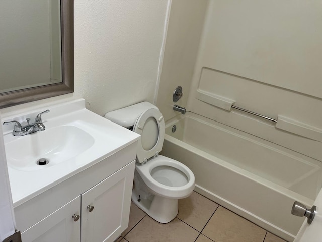 2645 W Robinson Ave, Fresno, CA 93705 - bathroom featuring tile patterned flooring, vanity, toilet, and bathtub / shower combination