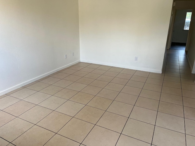 2645 W Robinson Ave, Fresno, CA 93705 - unfurnished room featuring light tile patterned flooring and baseboards