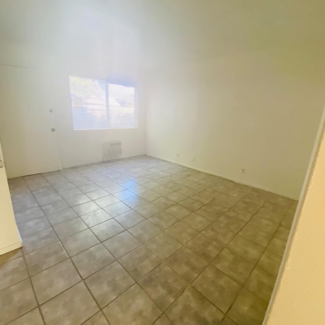 408 S Woodrow Ave, Fresno, CA 93702 - spare room featuring light tile patterned flooring