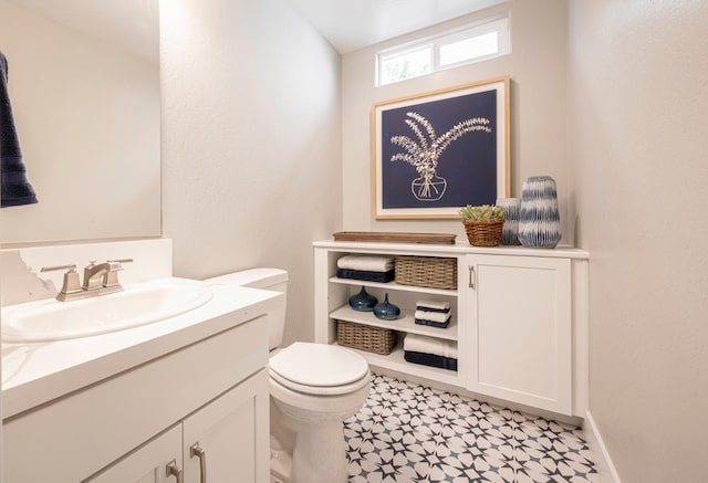 1171 Maclure Ave W, Madera, CA 93636 - half bathroom featuring vanity and toilet