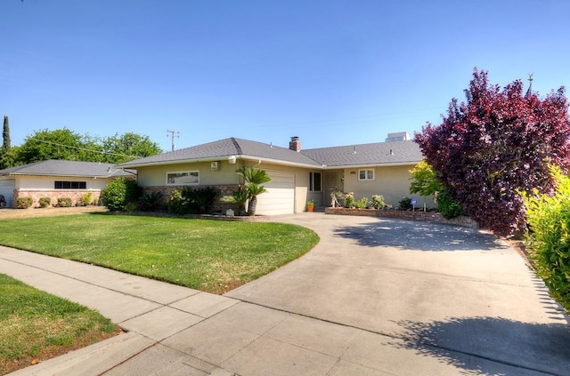3948 E Fedora Ave, Fresno, CA 93726 - ranch-style home with an attached garage, a front lawn, concrete driveway, and stucco siding