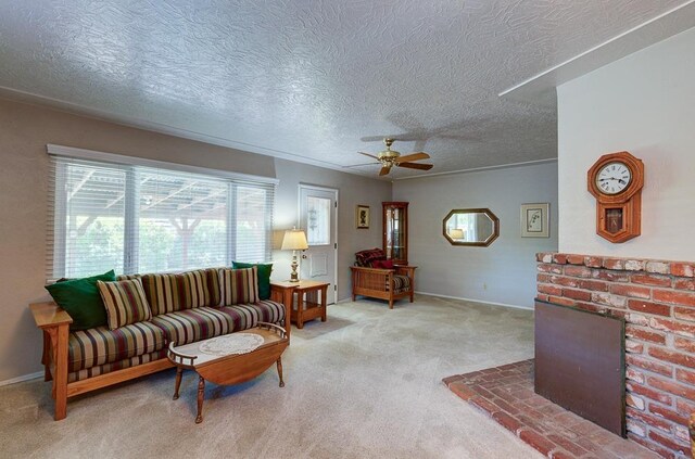 3948 E Fedora Ave, Fresno, CA 93726 - carpeted living area featuring ceiling fan, a textured ceiling, and a fireplace