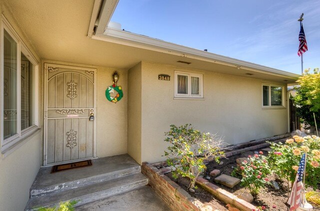 3948 E Fedora Ave, Fresno, CA 93726 - doorway to property with stucco siding