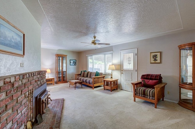 3948 E Fedora Ave, Fresno, CA 93726 - living room with ceiling fan, carpet, a textured ceiling, and a fireplace