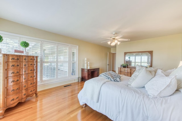 13155 W Shaw Ave, Kerman, CA 93630 - bedroom featuring light wood-style floors and ceiling fan
