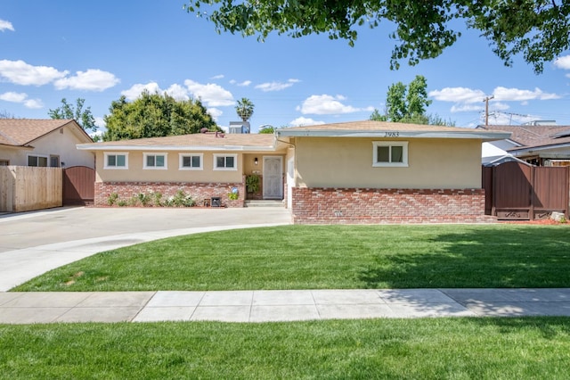 2983 E Northdale Ave, Fresno, CA 93726 - single story home with a gate, stucco siding, and brick siding