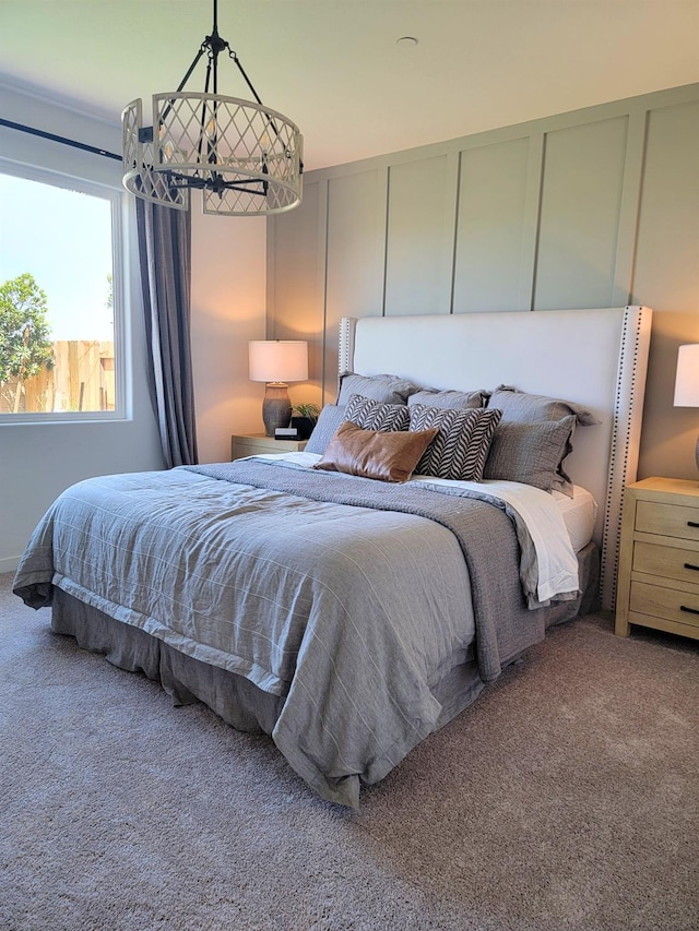 1163 Maclure Ave W, Madera, CA 93636 - carpeted bedroom featuring a chandelier