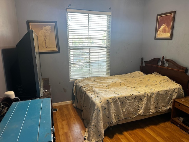 4769 N Emerald Peak Dr, Clovis, CA 93619 - bedroom featuring wood finished floors and baseboards