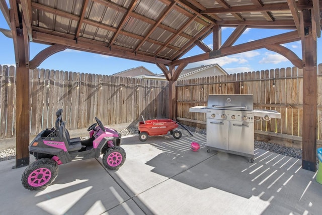 view of patio / terrace featuring fence and area for grilling
