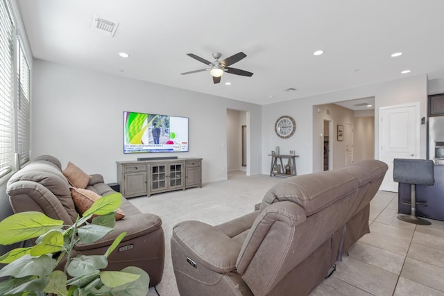 living area with ceiling fan, recessed lighting, and light tile patterned floors