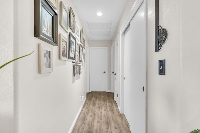 5266 E Harvest Ln, Fresno, CA 93725 - hall featuring light wood finished floors and baseboards
