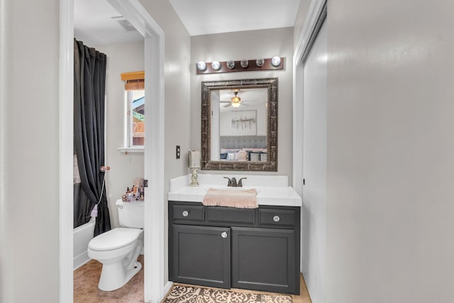 5266 E Harvest Ln, Fresno, CA 93725 - bathroom with toilet, vanity, and baseboards