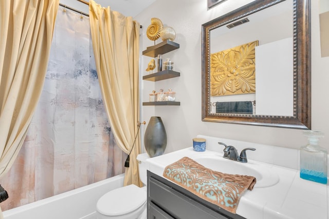 5266 E Harvest Ln, Fresno, CA 93725 - bathroom featuring vanity, toilet, and shower / bath combo