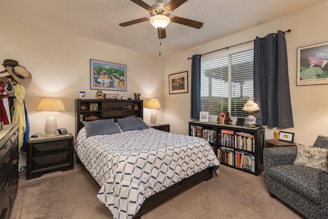 bedroom with carpet floors and a ceiling fan