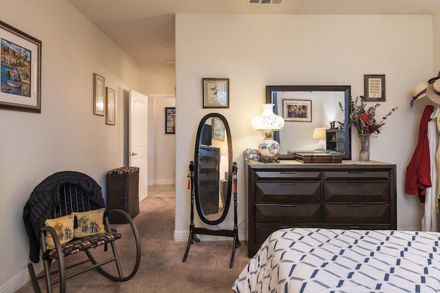 carpeted bedroom with baseboards