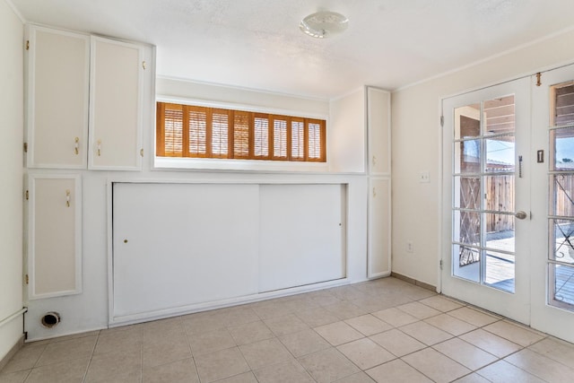 324 E San Mateo St, Avenal, CA 93204 - unfurnished room featuring healthy amount of natural light and light tile patterned floors