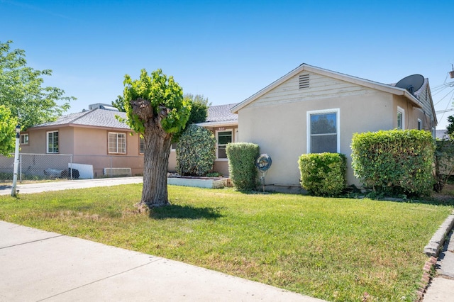 324 E San Mateo St, Avenal, CA 93204 - single story home featuring stucco siding