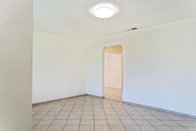 324 E San Mateo St, Avenal, CA 93204 - unfurnished room with arched walkways and baseboards