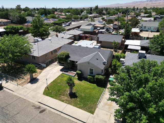 324 E San Mateo St, Avenal, CA 93204 - aerial perspective of suburban area with a mountainous background