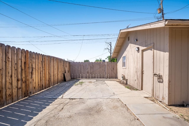 324 E San Mateo St, Avenal, CA 93204 - view of patio with a gate and fence