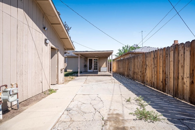 324 E San Mateo St, Avenal, CA 93204 - exterior space featuring fence, a patio area, and driveway