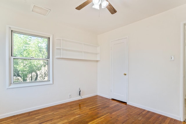 324 E San Mateo St, Avenal, CA 93204 - empty room featuring ceiling fan, wood finished floors, and baseboards