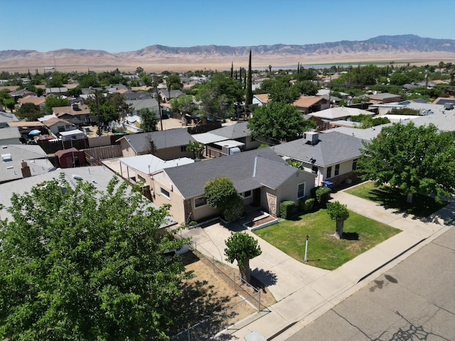324 E San Mateo St, Avenal, CA 93204 - aerial view of residential area with a mountainous background