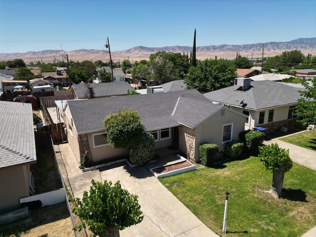 324 E San Mateo St, Avenal, CA 93204 - aerial perspective of suburban area featuring a mountain backdrop