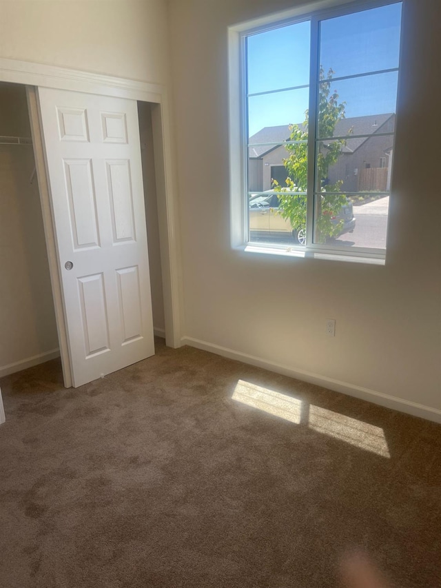 13320 Fourth St Unit Lot1, Parlier, CA 93648 - unfurnished bedroom with carpet, a closet, and baseboards