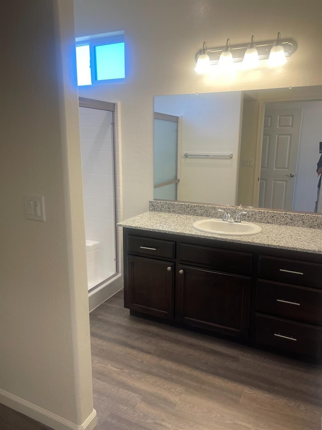 13320 Fourth St Unit Lot1, Parlier, CA 93648 - full bathroom with a stall shower, vanity, and wood finished floors