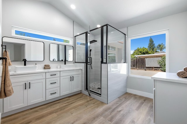 1801 E Omaha Ave, Fresno, CA 93720 - full bath featuring a shower stall, double vanity, wood finished floors, recessed lighting, and baseboards