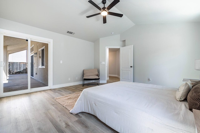 1801 E Omaha Ave, Fresno, CA 93720 - bedroom featuring access to exterior, wood finished floors, vaulted ceiling, baseboards, and a ceiling fan